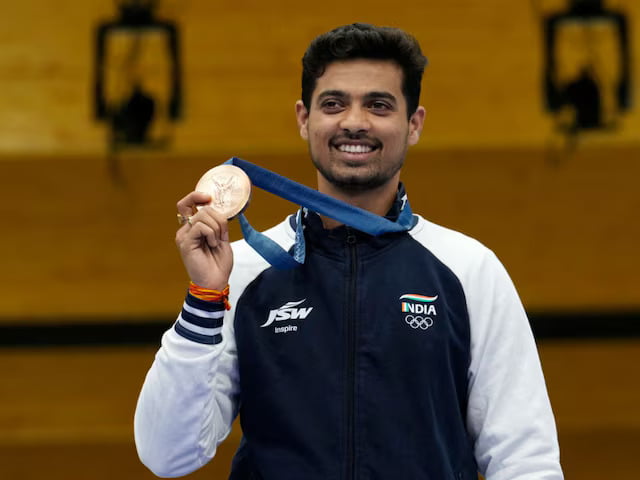 swapnil with medal