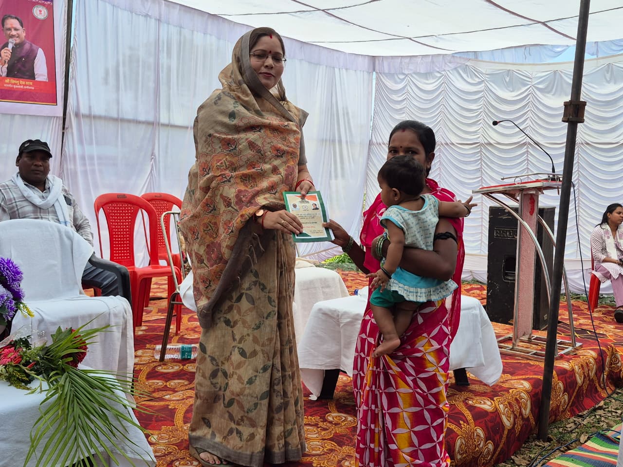 Good Governance Festival 2026: Beneficiaries receive ration cards at Simda camp, smiles on faces