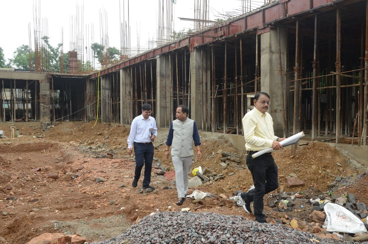 Collector Inspects Composite Building Under Construction; Issues Directives for Quality Work